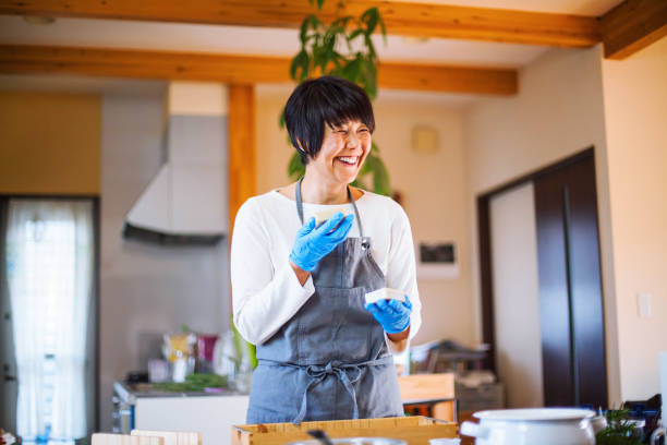 A woman happy with the results of her homemade soap